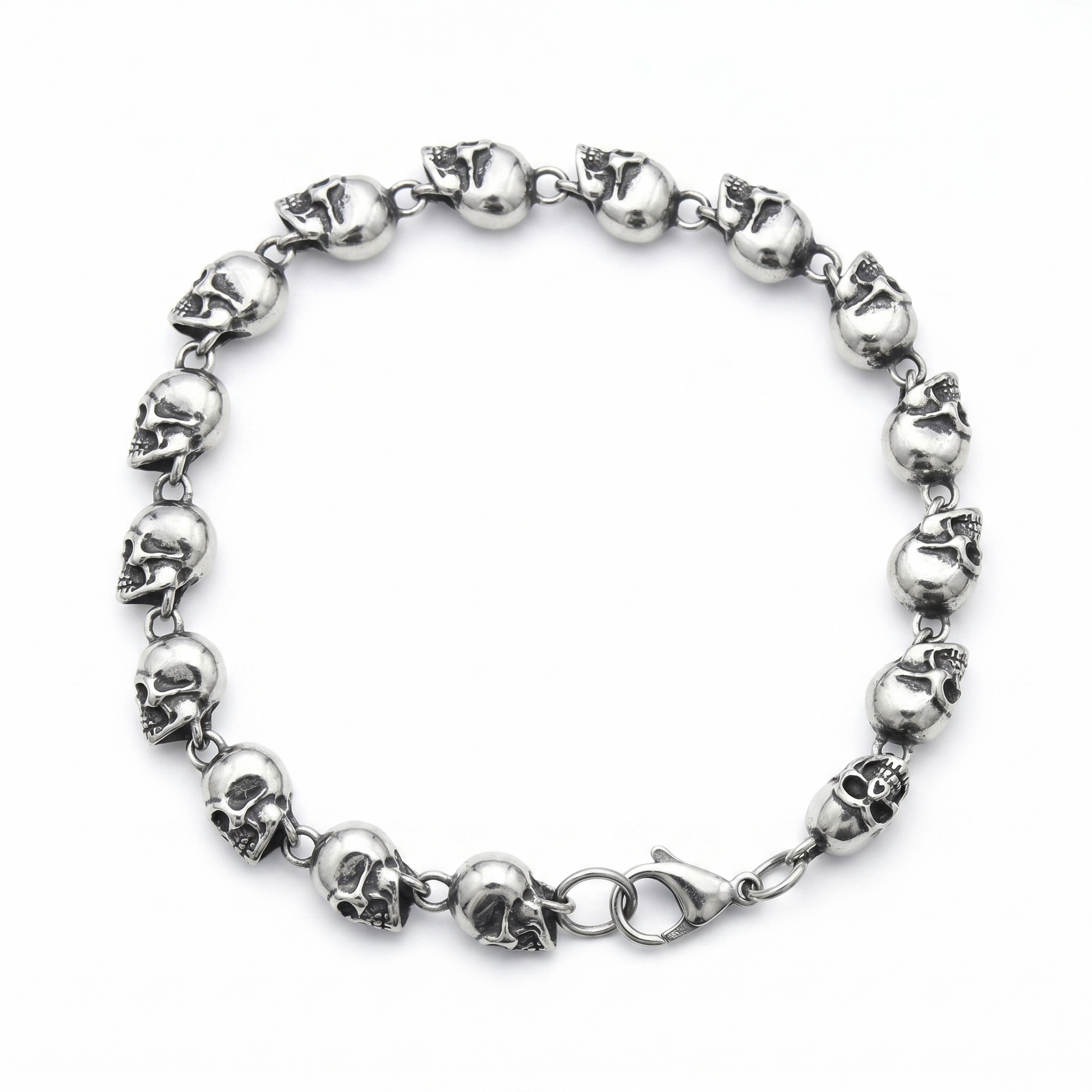 Silver skull bracelet on a white background