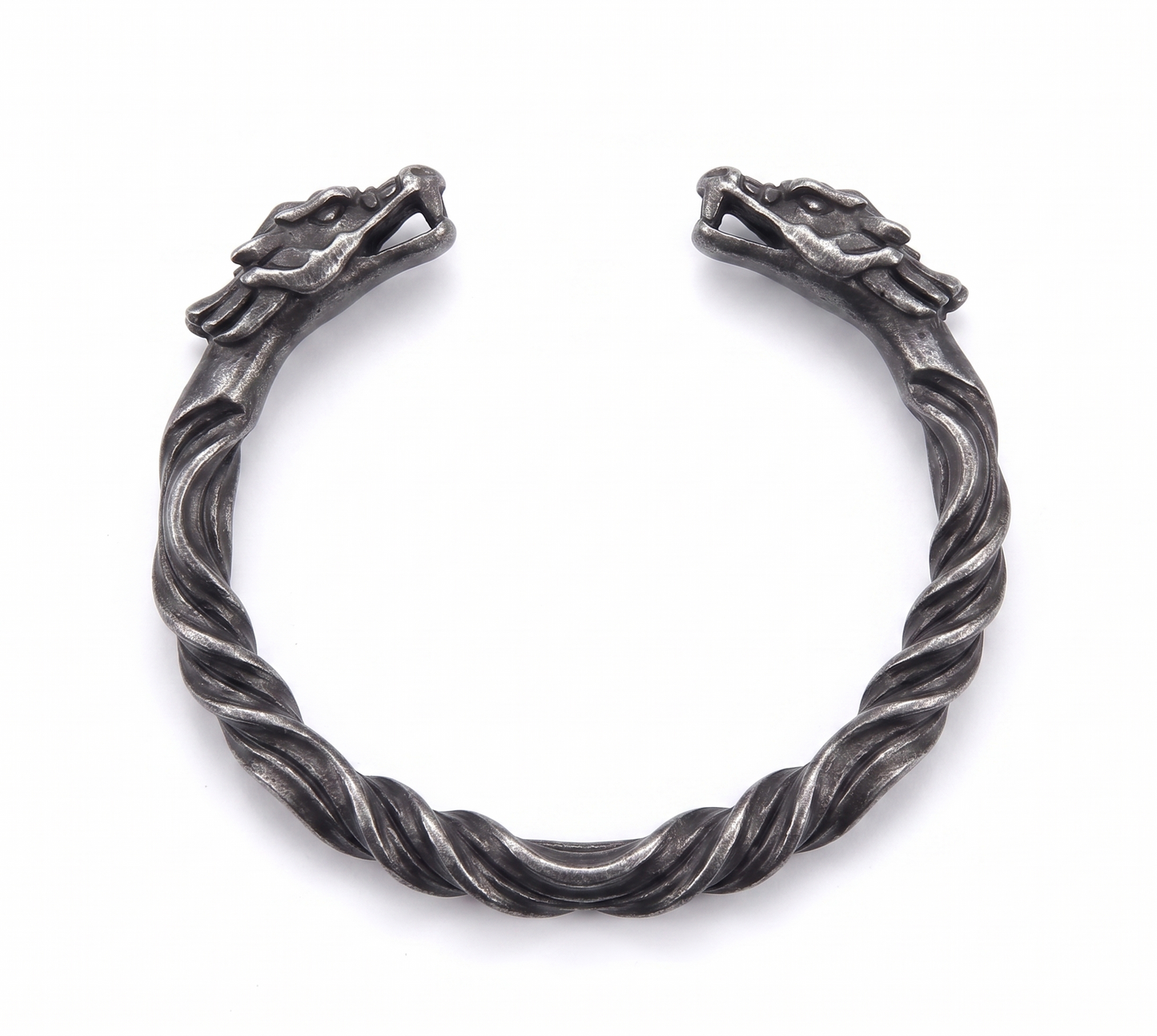 Silver twisted bracelet on a white background