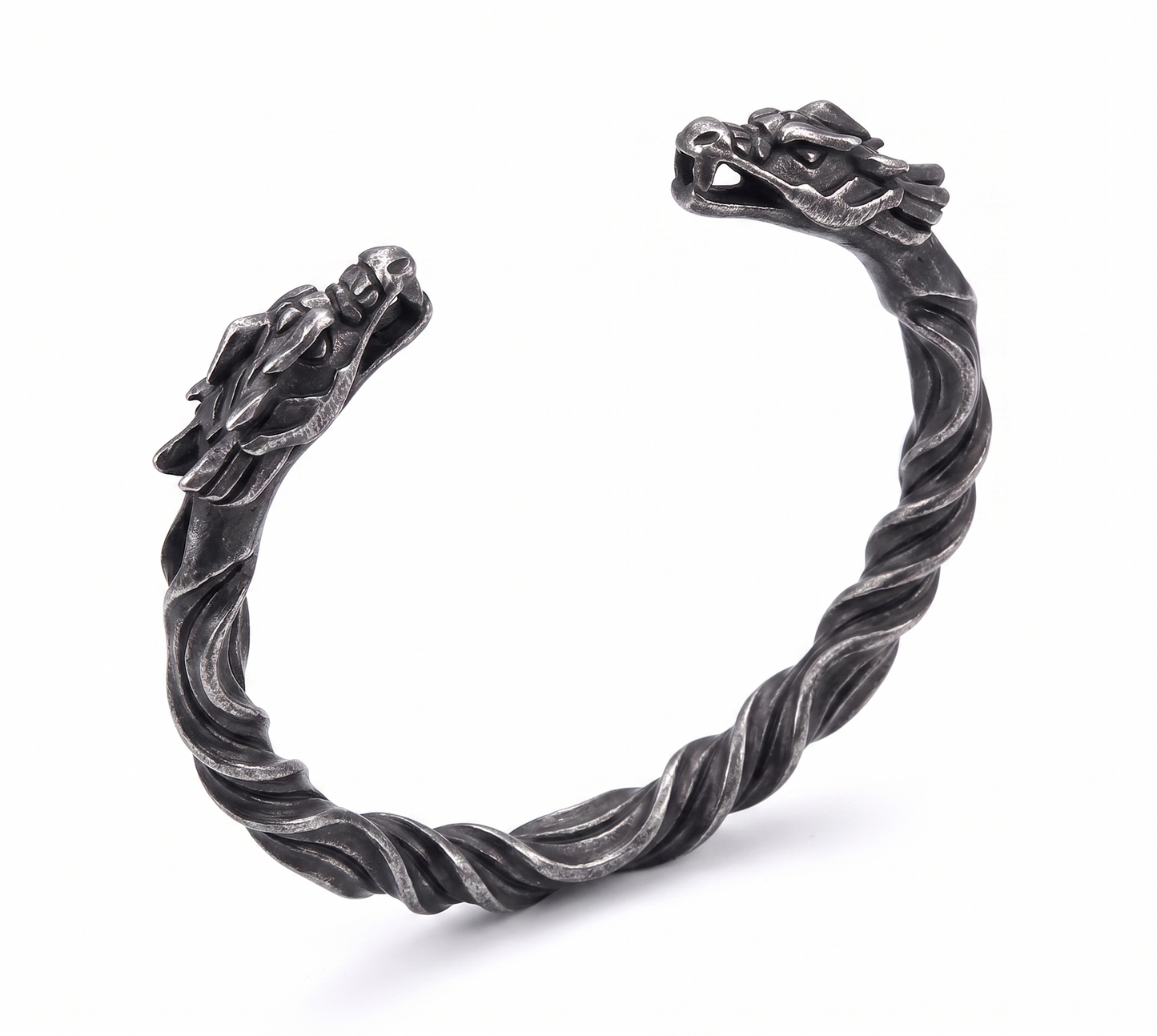 Silver dragon bracelet on a white background